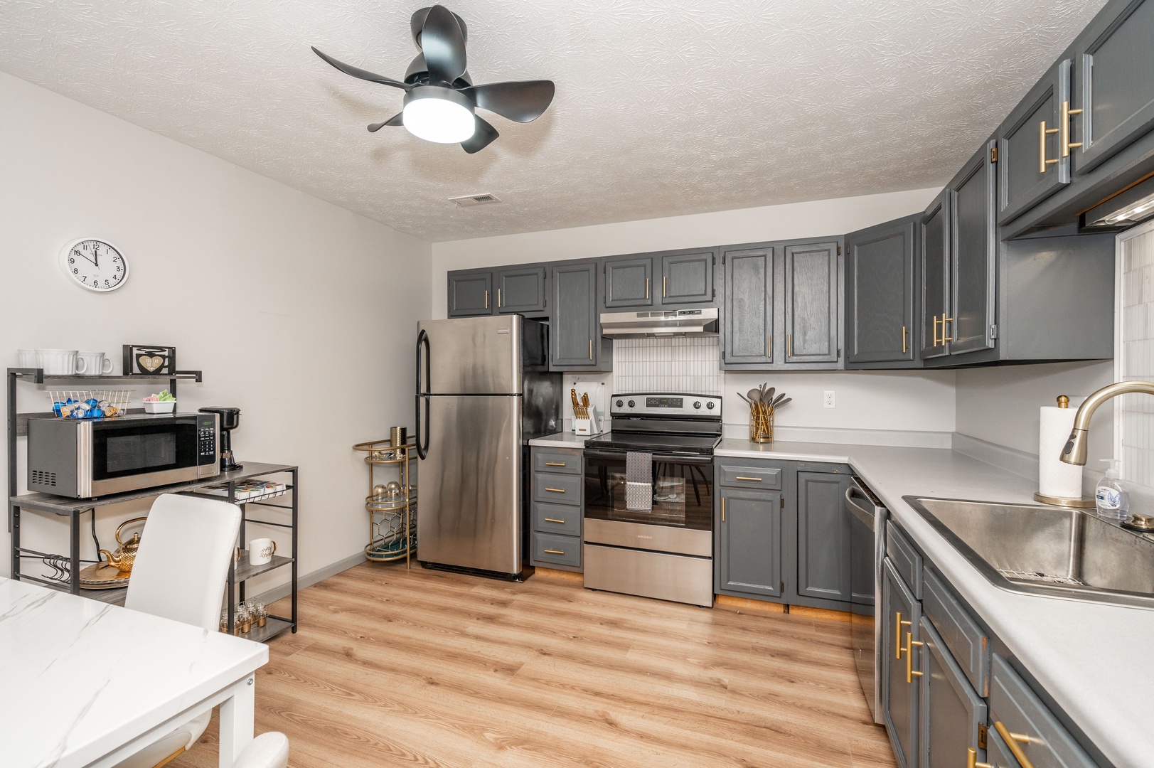 Apartment 1’s elegant kitchen offers ample space & all the comforts of home