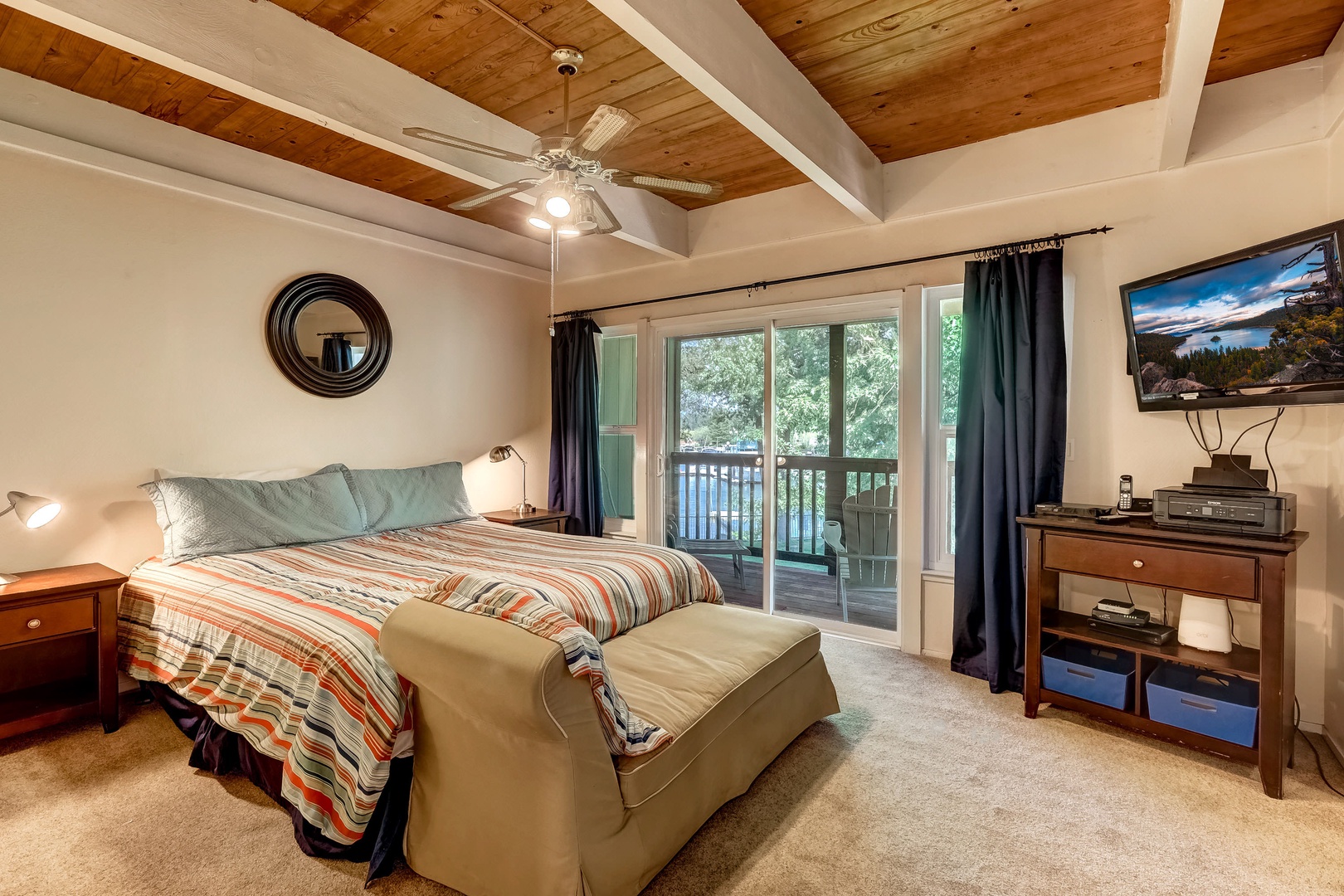 Master bedroom: King bed, cable TV, DVC player, private balcony (upstairs)
