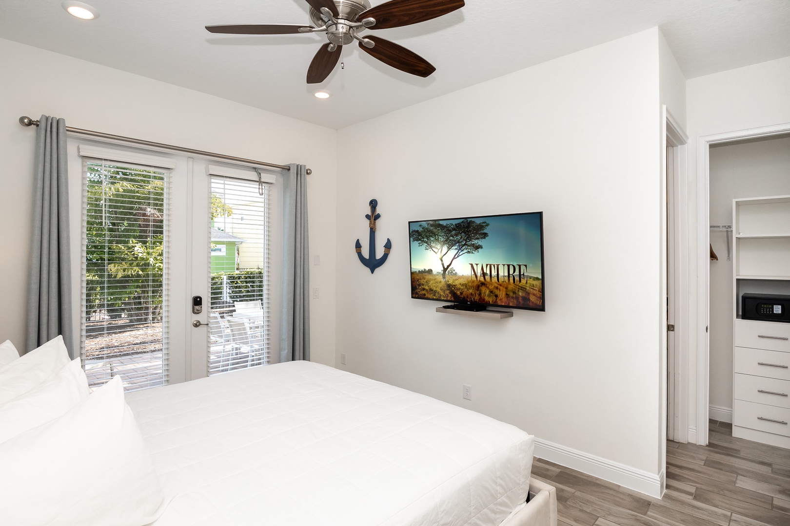 The 1st floor king suite includes a Smart TV, private en suite, & patio access