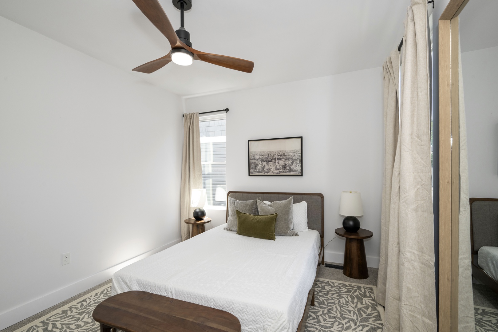 The final bedroom sanctuary includes a regal queen bed & ceiling fan