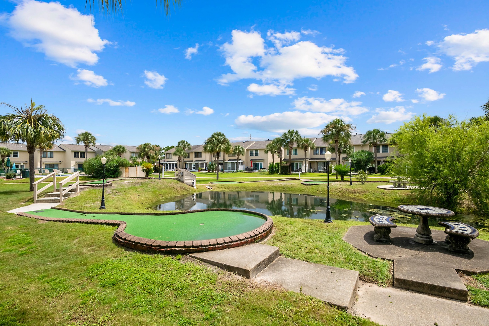 Lounge the day away with putting green & water views on the patio