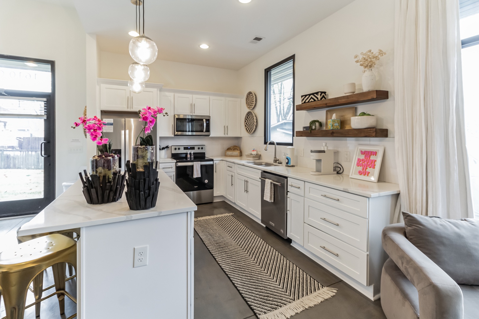 Unit C1: The sleek, updated kitchen offers ample space & all the comforts of home