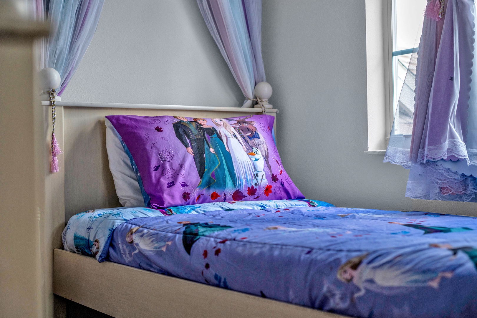 Bedroom 3 Disney Princess themed with 2 twin beds, and Smart TV