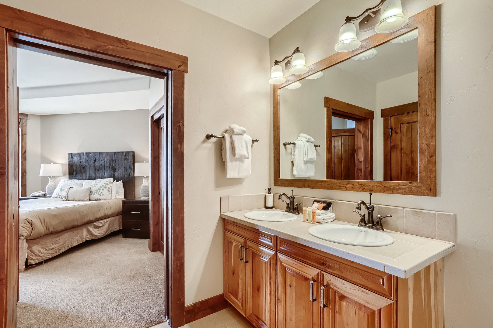 Bathroom 2 shared en-suite with walk-in shower, and accessible from the living area