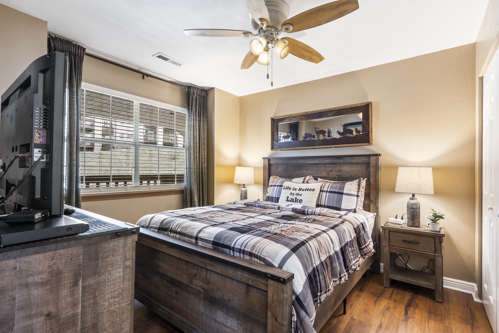 The first bedroom retreat offers a queen-sized bed, ensuite, & Smart TV
