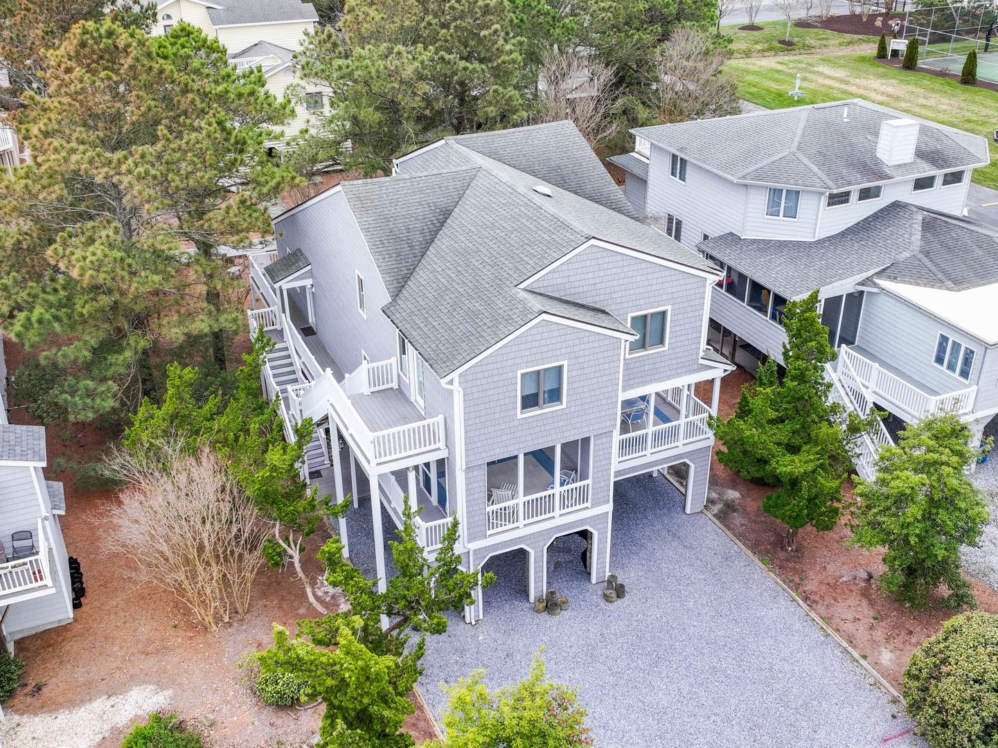 This glorious Delaware beach home offers ample parking and space for the whole family