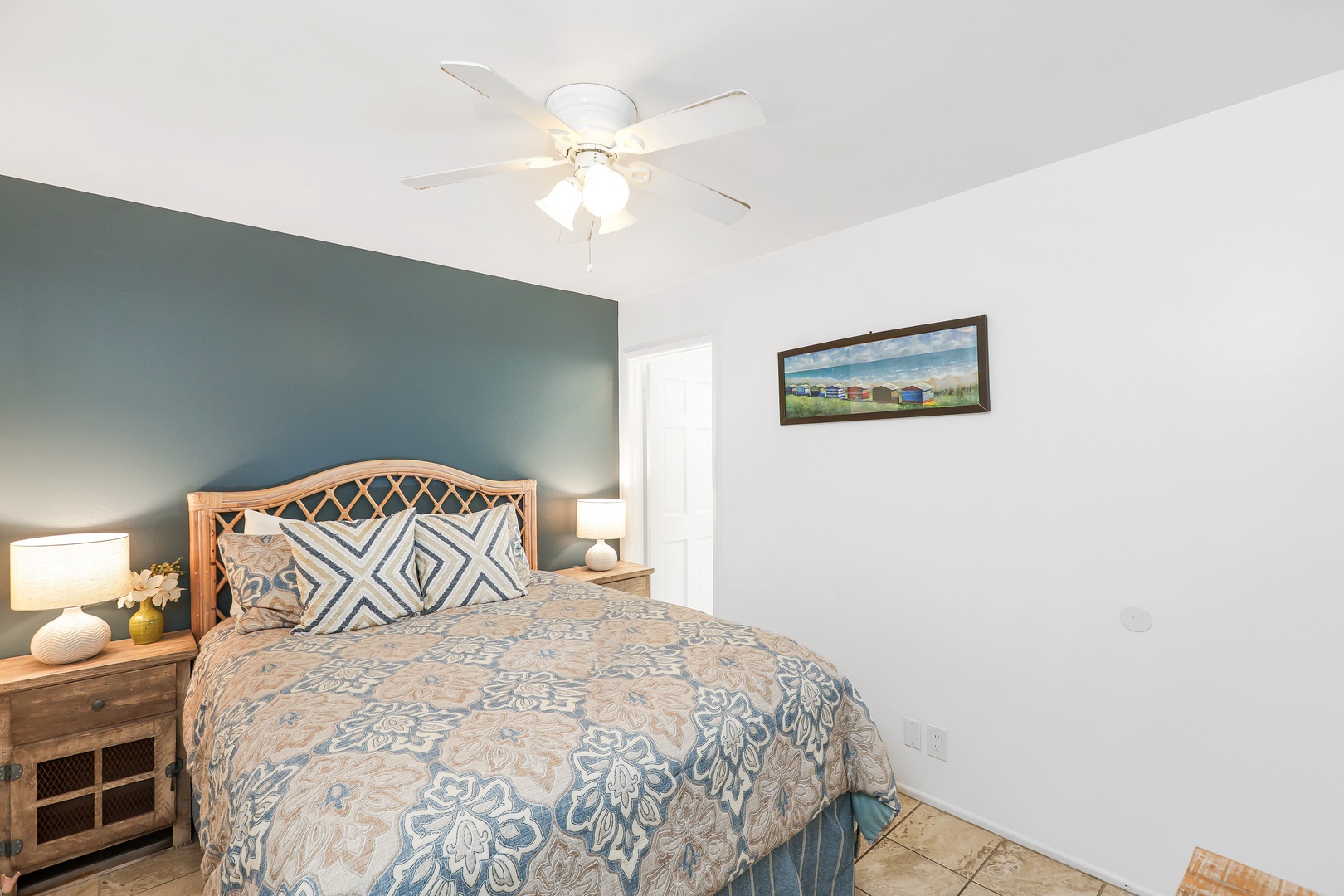 The serene queen suite boasts a private ensuite bath & TV