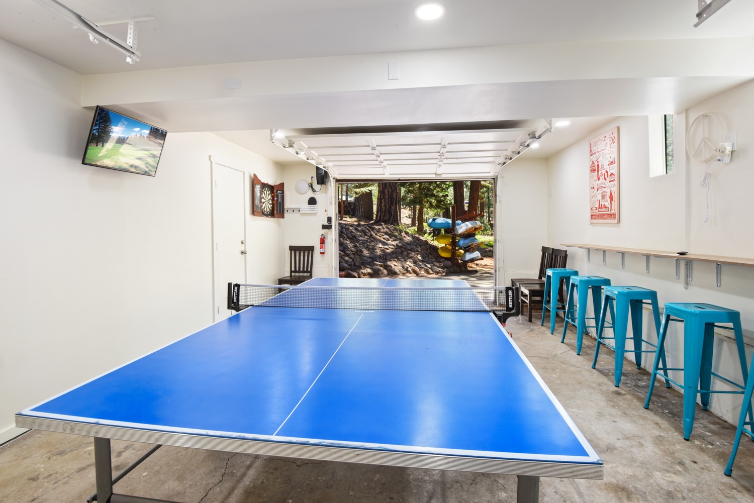 Garage features a ping pong table