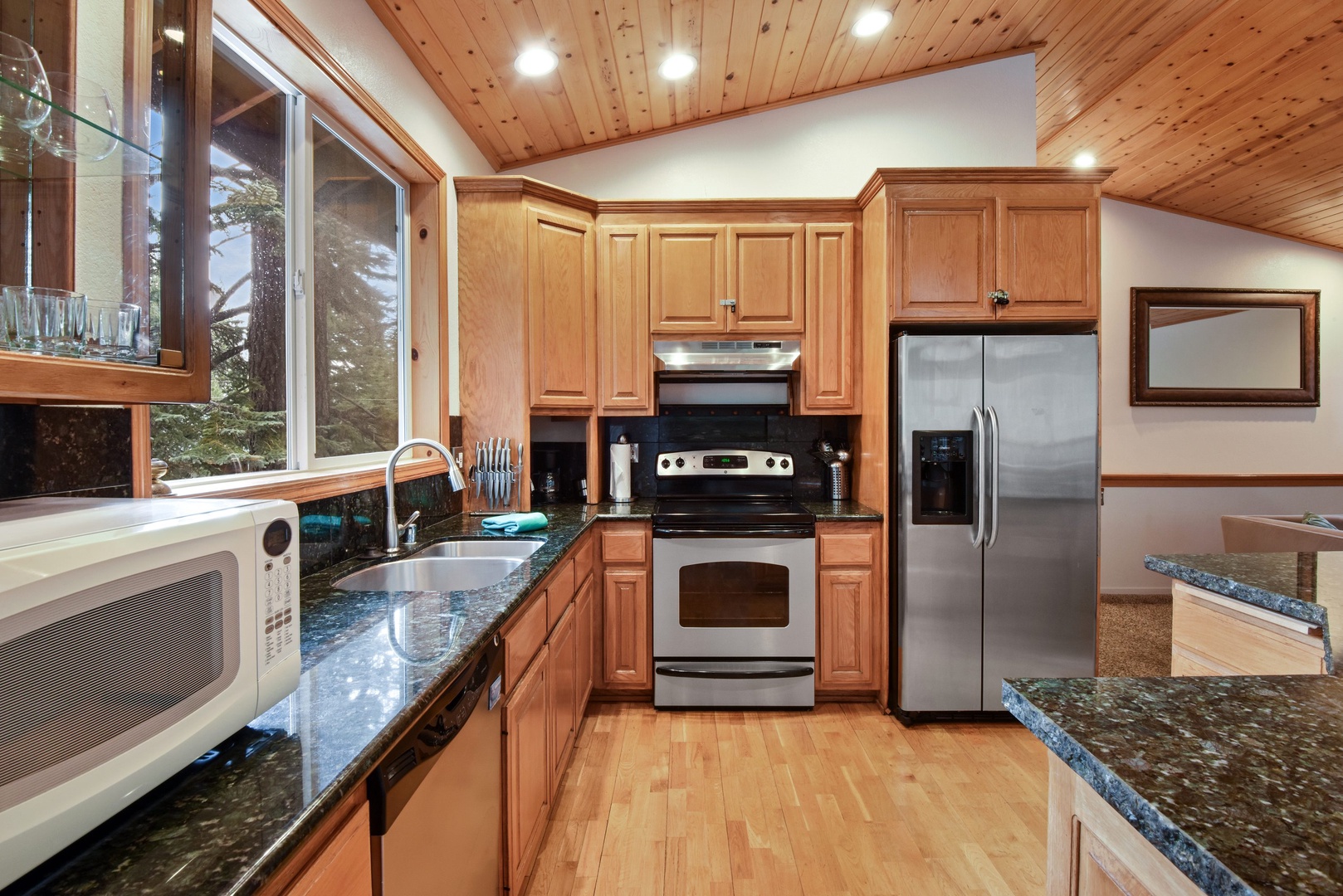 Full kitchen with coffee maker, toaster, and more