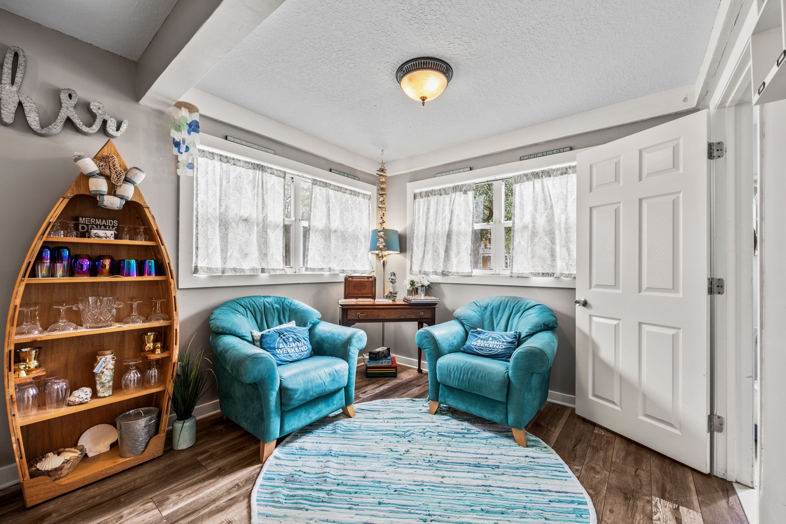 Bright living area with ample seating and Smart TV