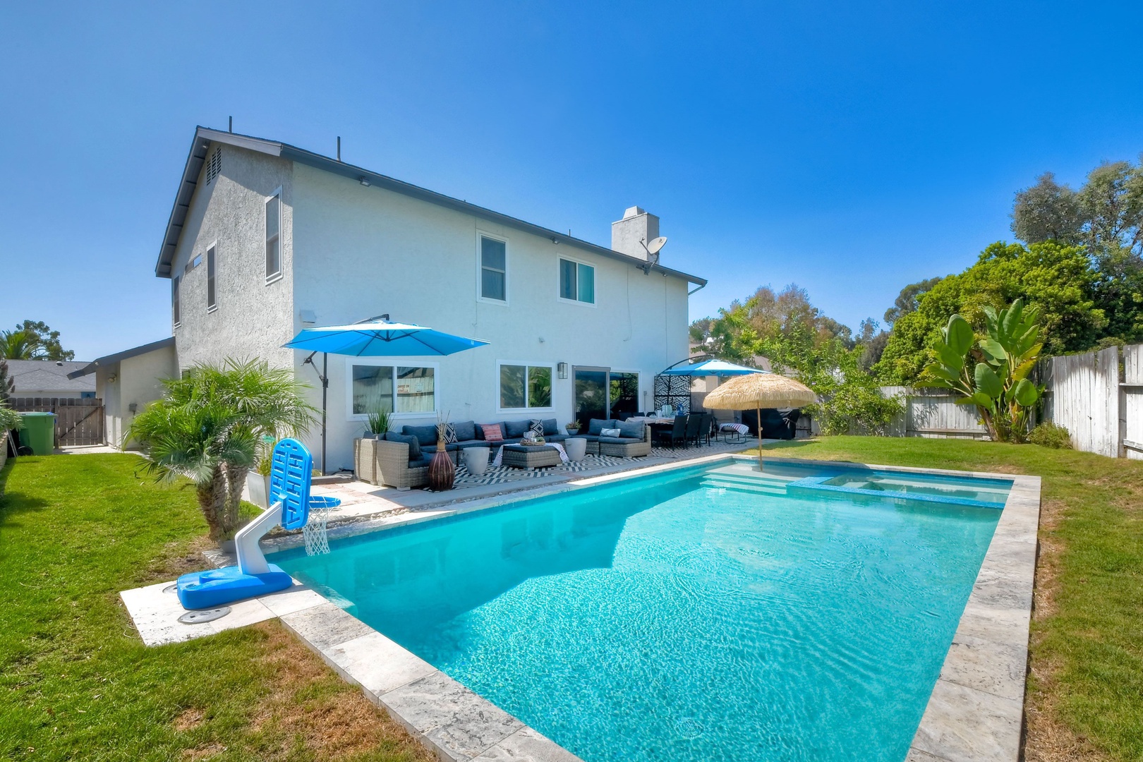 Soak up the sun in the spacious backyard with pool