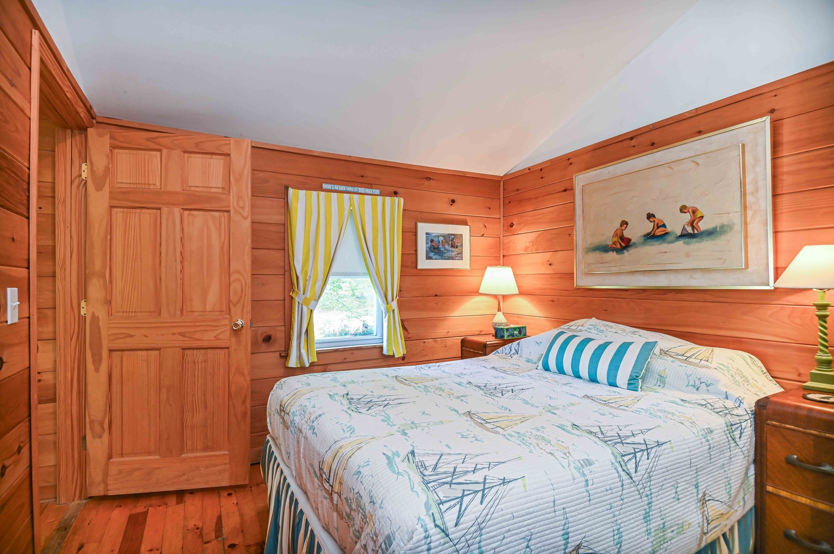 Enjoy serene vibes and natural textures in this wooden queen bedroom