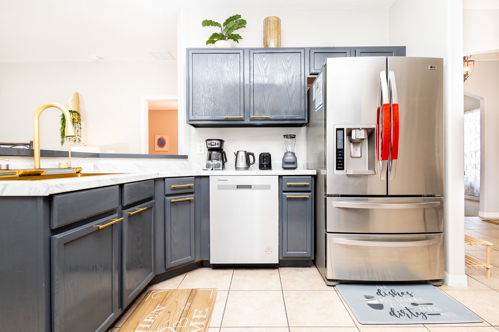 The open, airy kitchen offers ample space & all the comforts of home