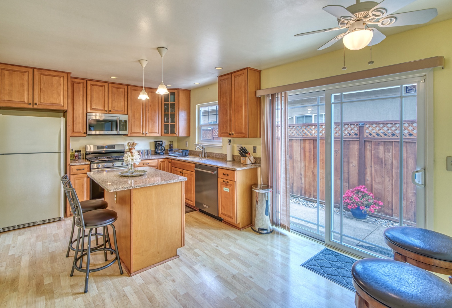 The open, airy kitchen offers ample space & all the comforts of home