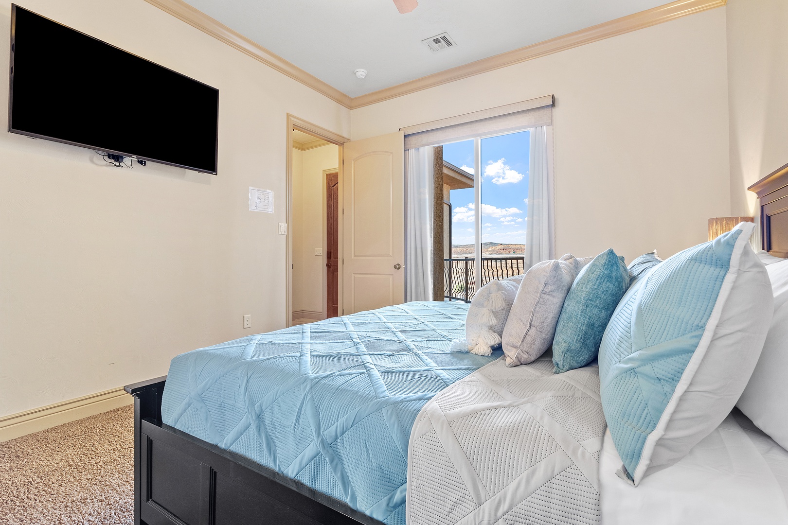 The serene king suite offers a private en suite, Smart TV, & balcony access