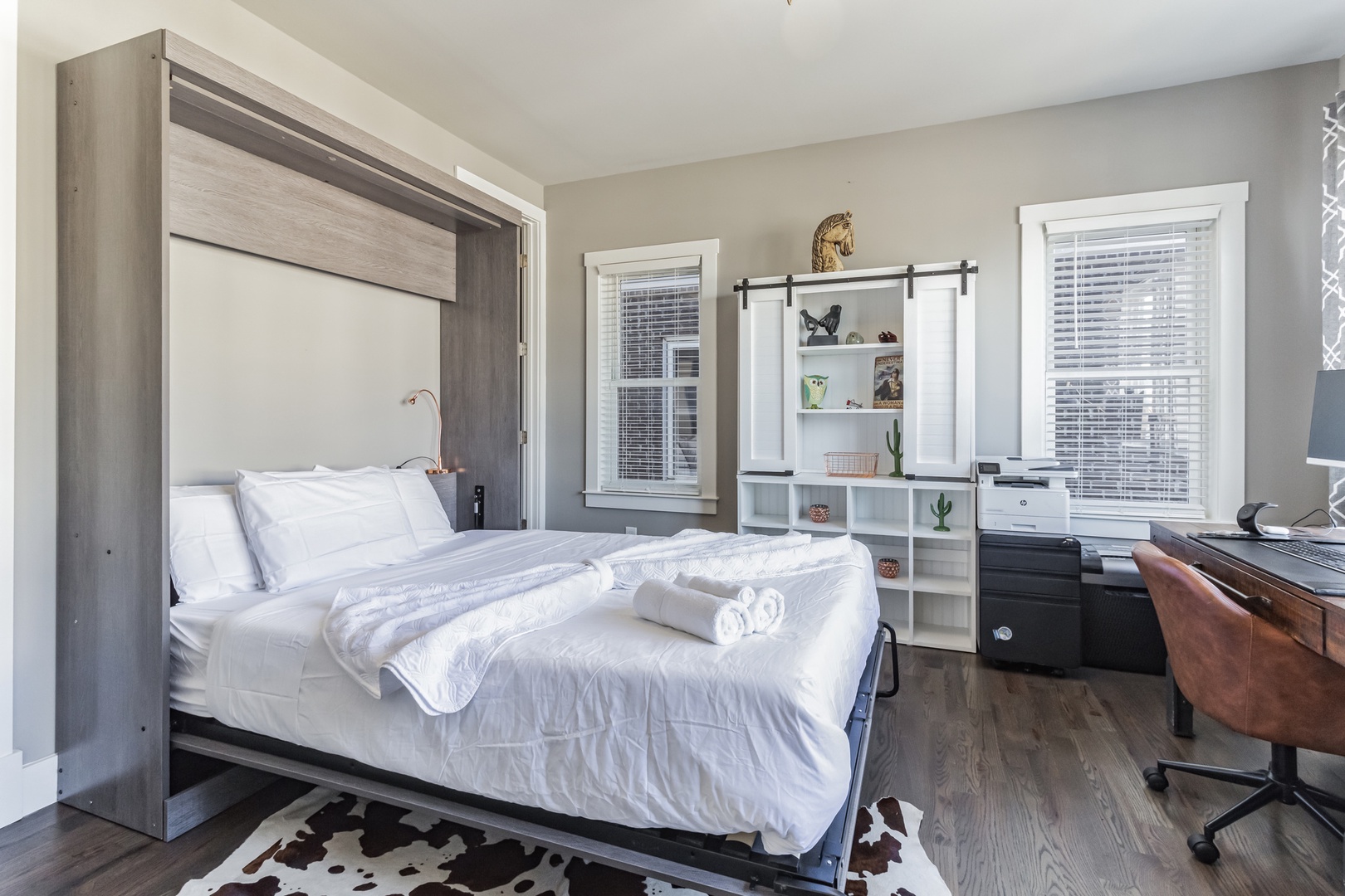 This 1st-floor suite offers a queen murphy bed, private ensuite, & desk space