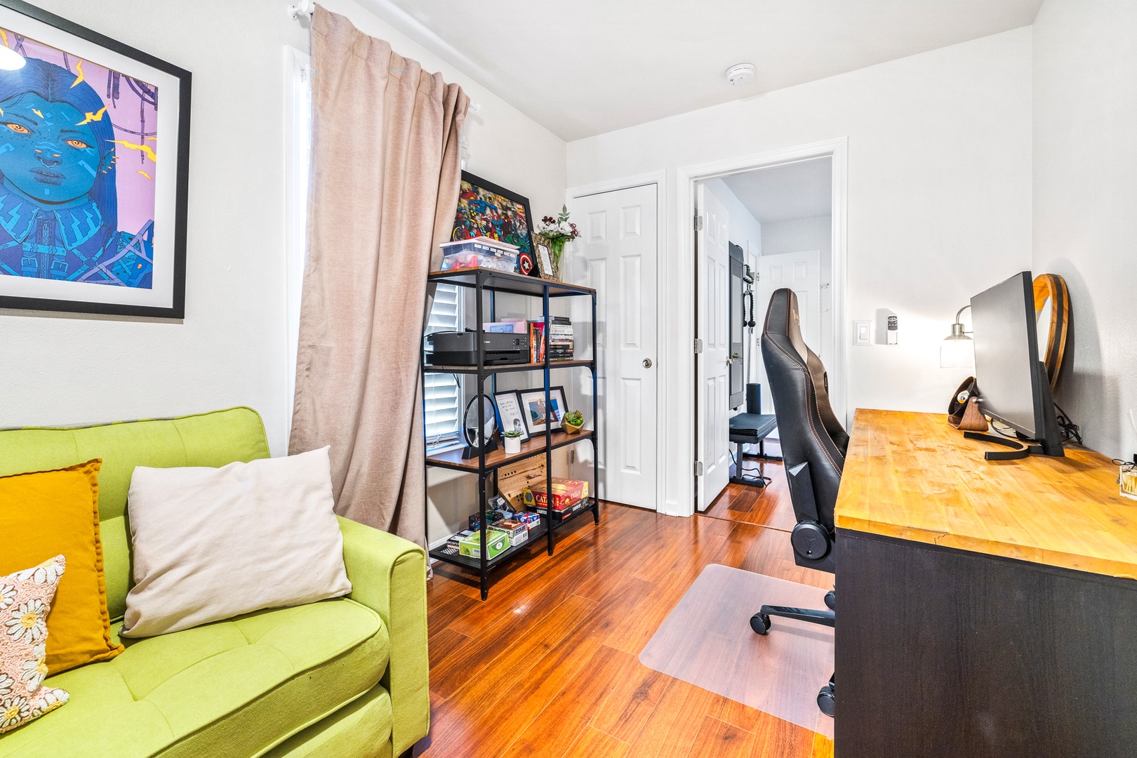 Game room with sofa sleeper, foosball, and shared ensuite