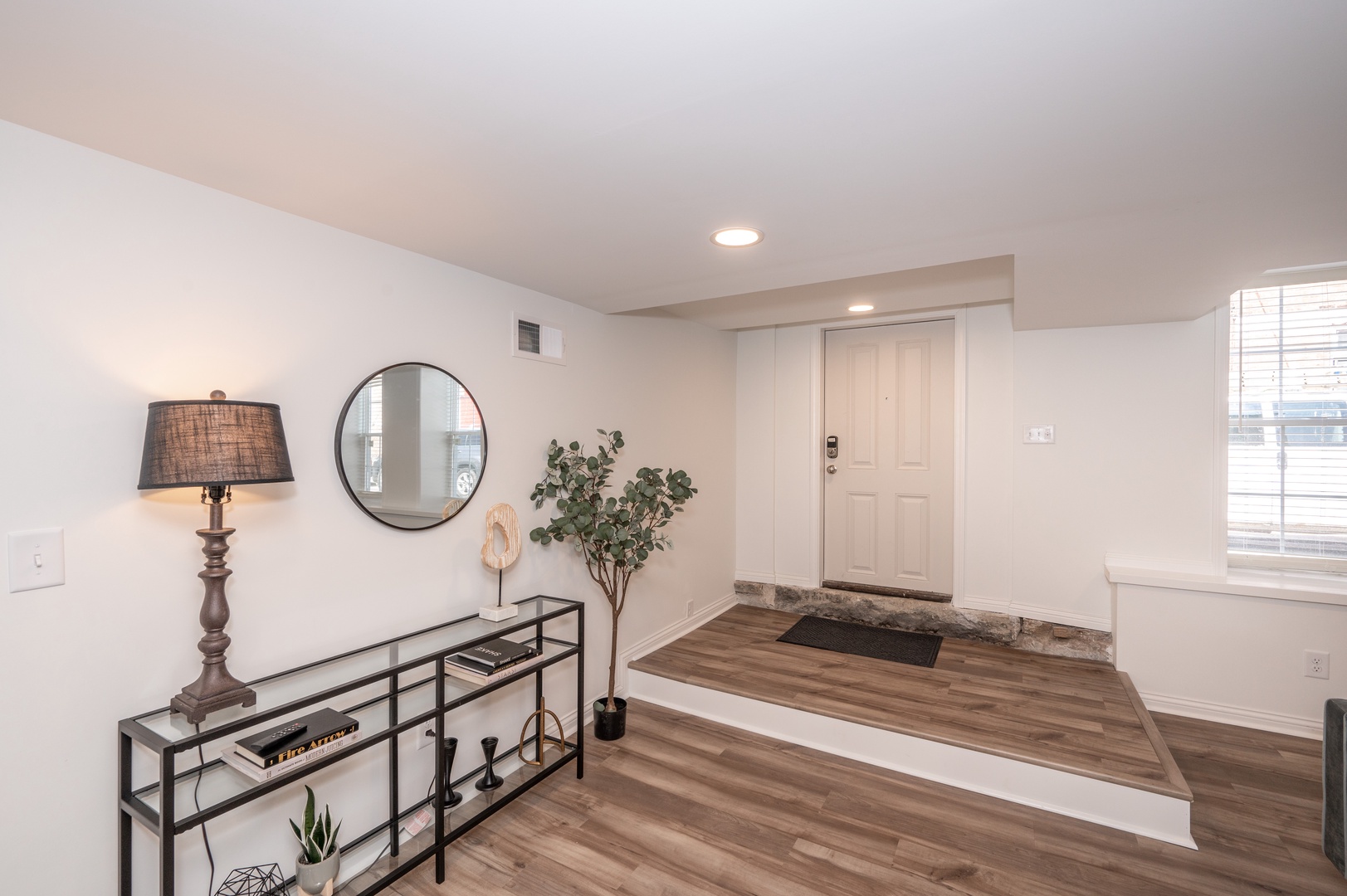 Unit 101: A comfortable open entryway will welcome you home