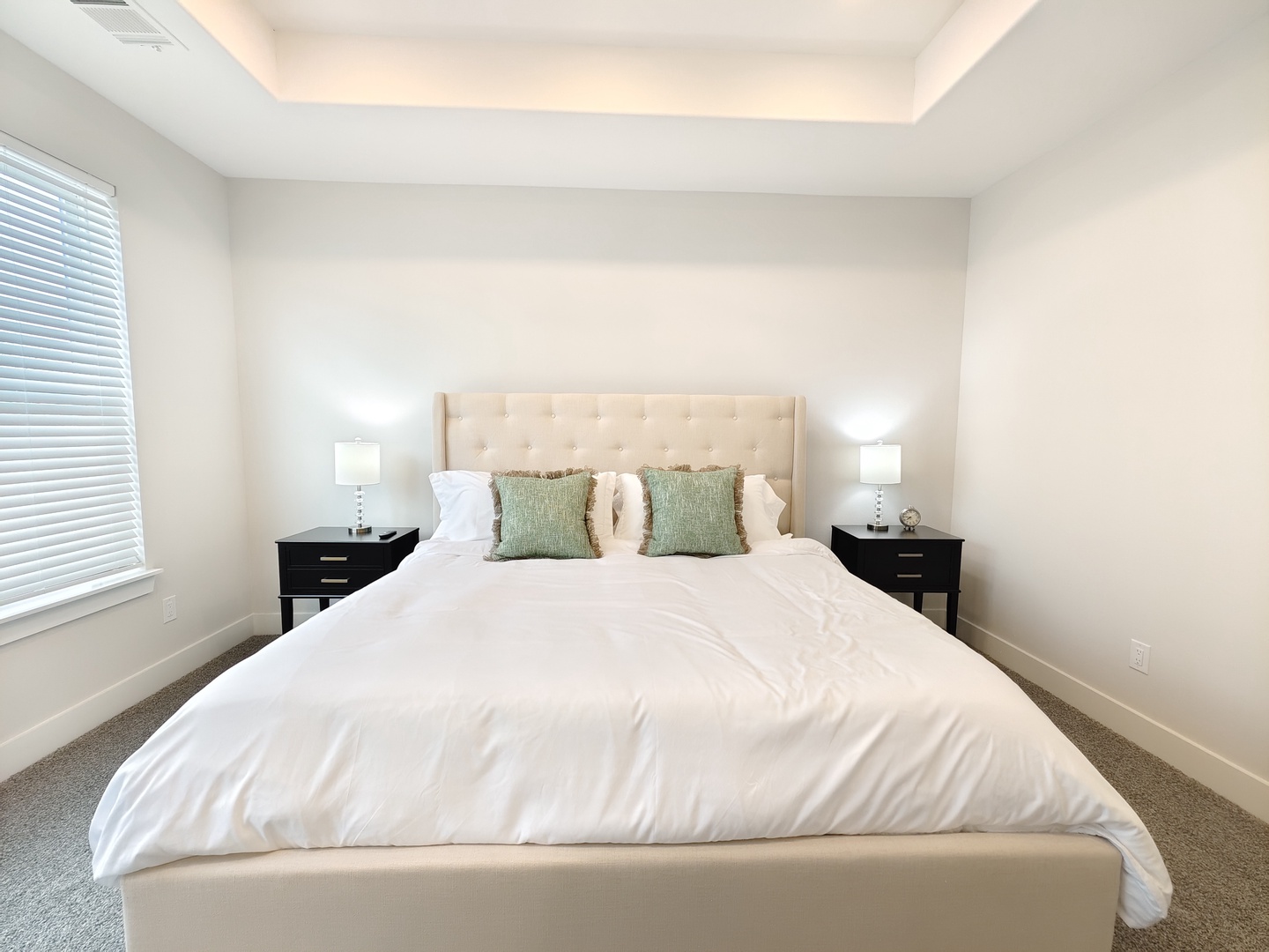 The 3rd-floor king suite boasts a grand ensuite, large closet, & Smart TV