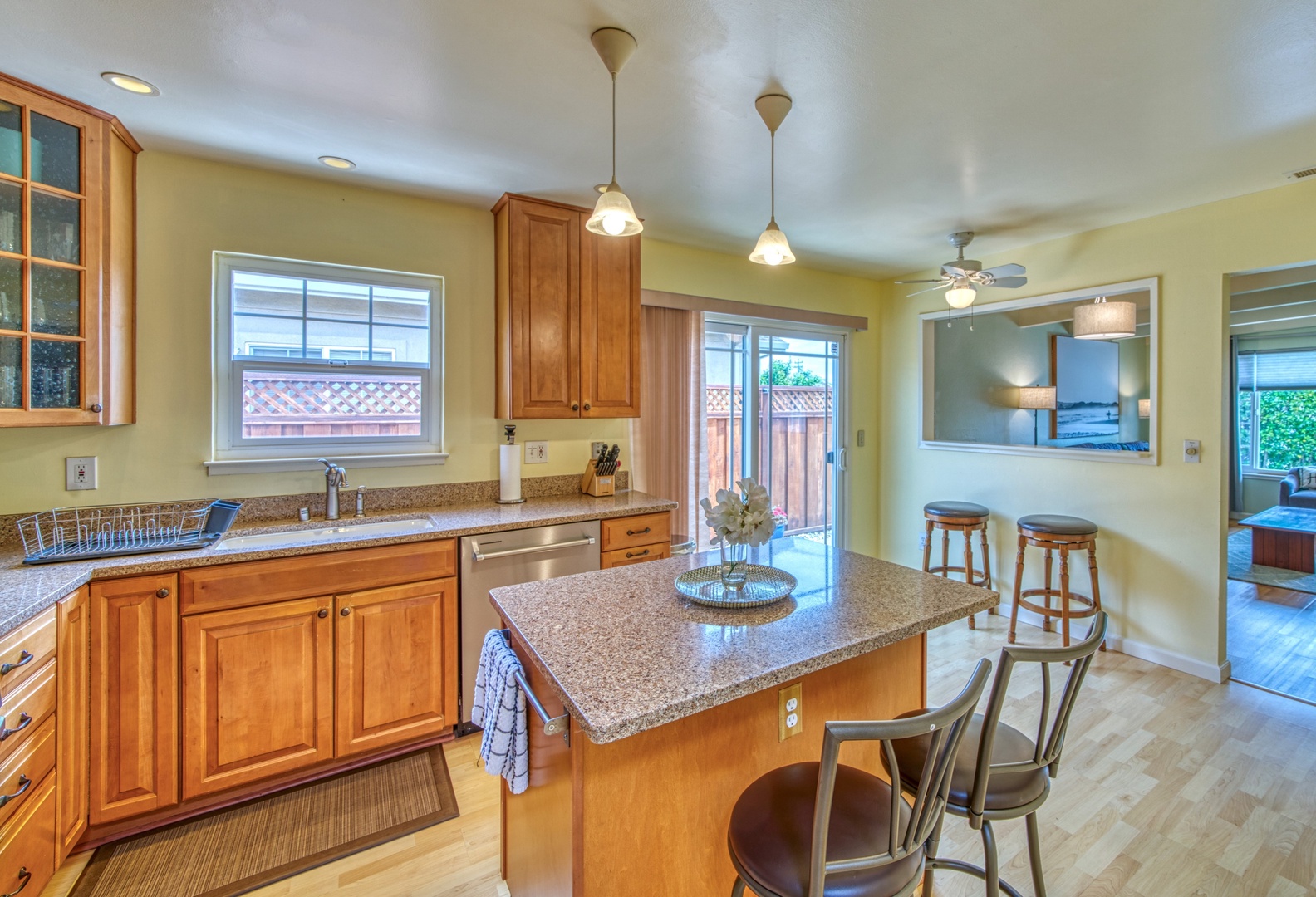 The open, airy kitchen offers ample space & all the comforts of home