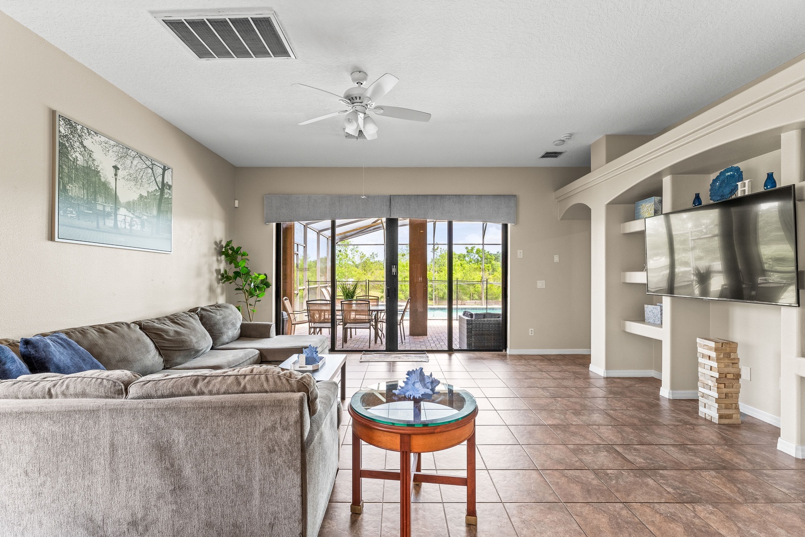 Spacious living area with plush seating, and Smart TV