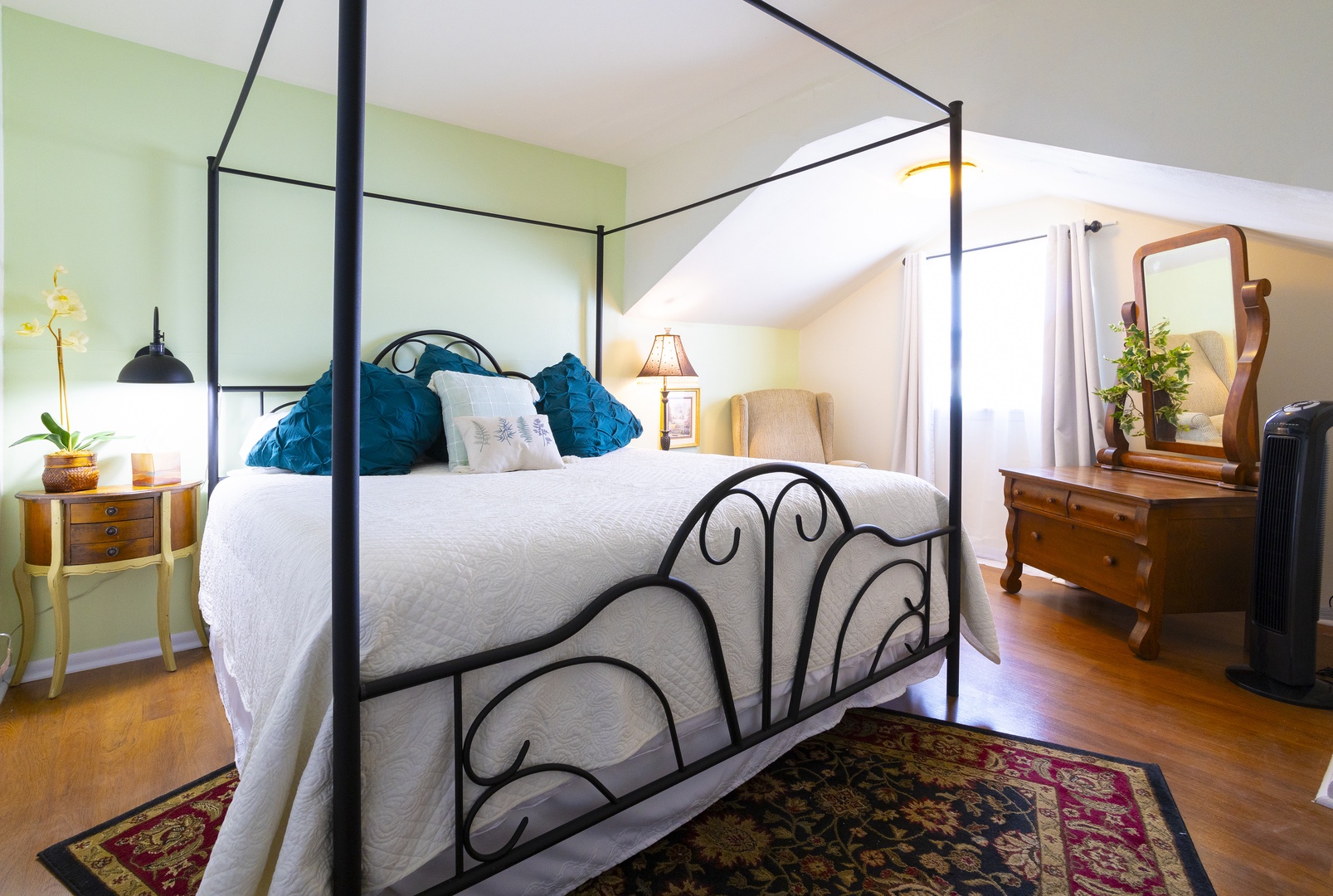 The primary bedroom boasts a regal king bed & smart TV