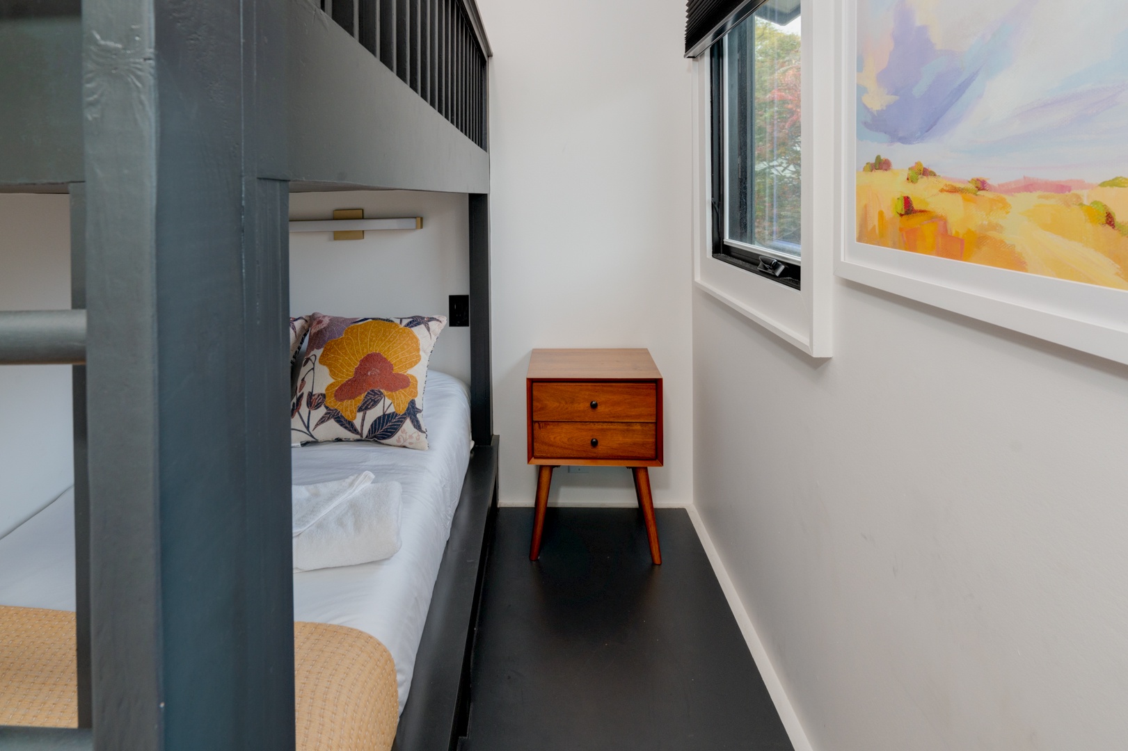 The tranquil loft retreat offers a twin-over-twin bunkbed
