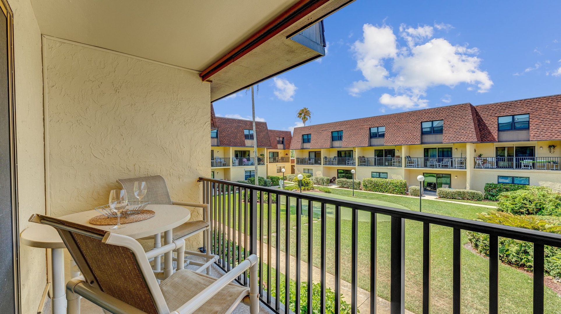 The balcony is the perfect place to enjoy coffee or an evening beverage