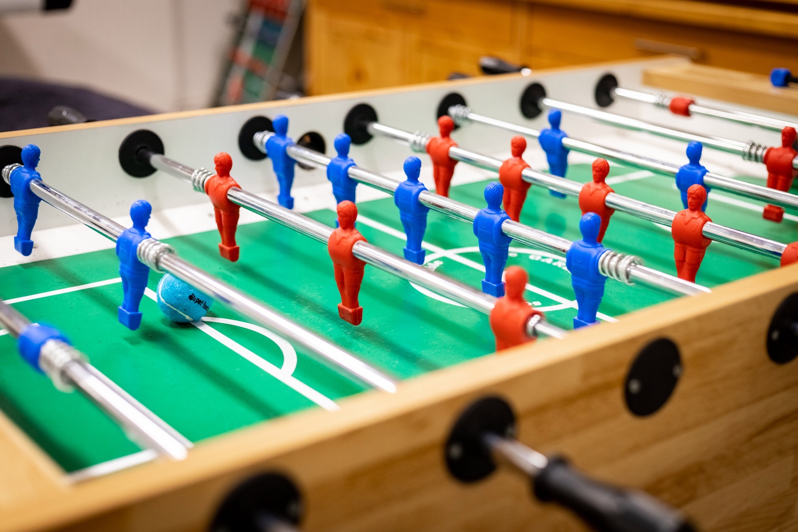 Game room with air hockey, foosball, and darts (1st floor)