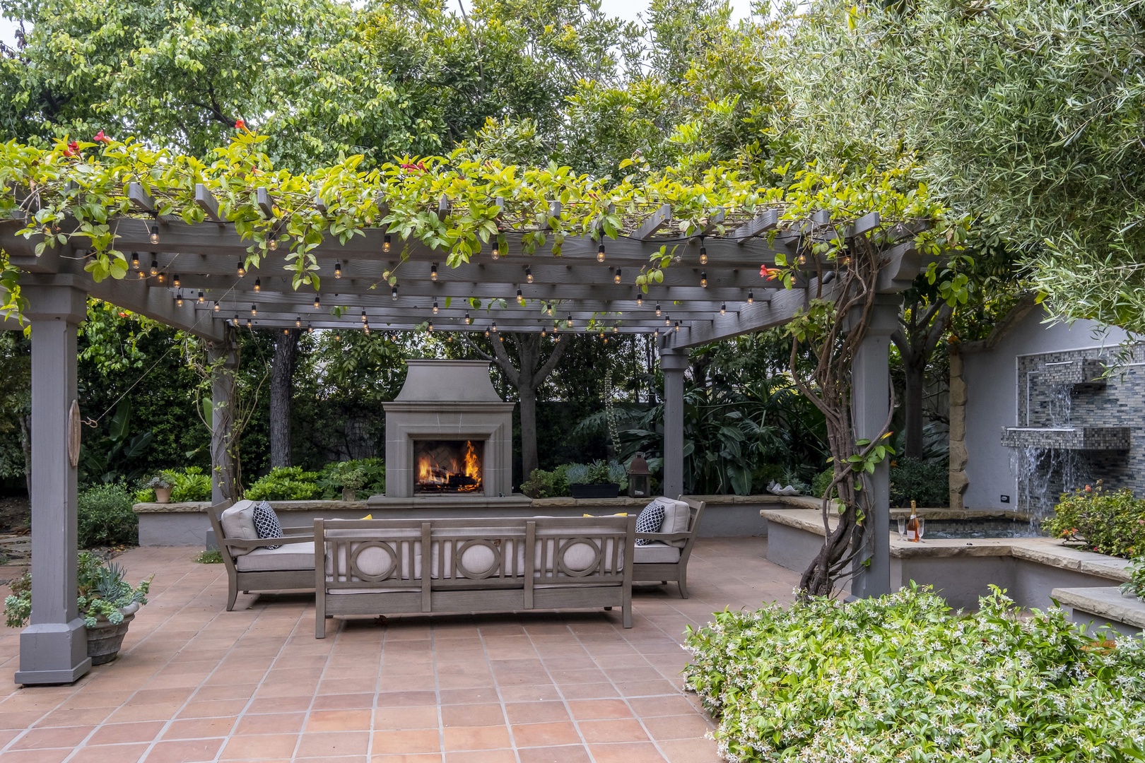 Beautiful backyard with firepit, conversational seating, and BBQ