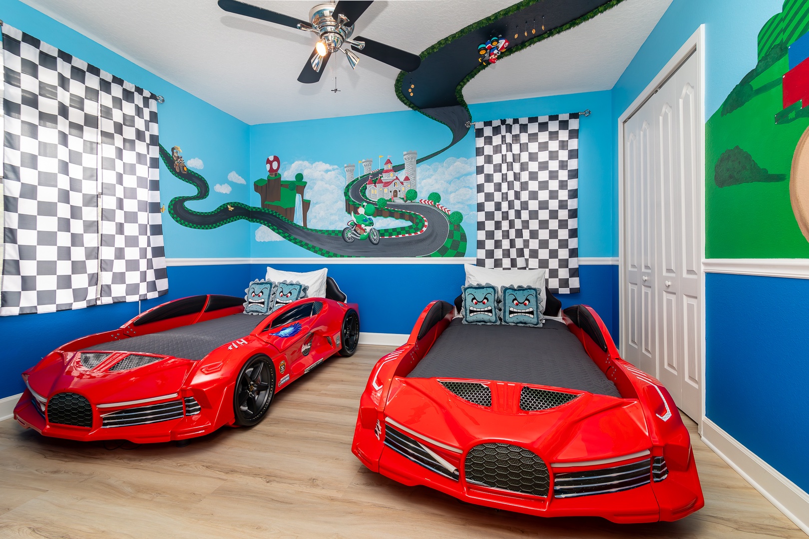 This Mario Kart bedroom with 2 twin beds is the ultimate finish line!