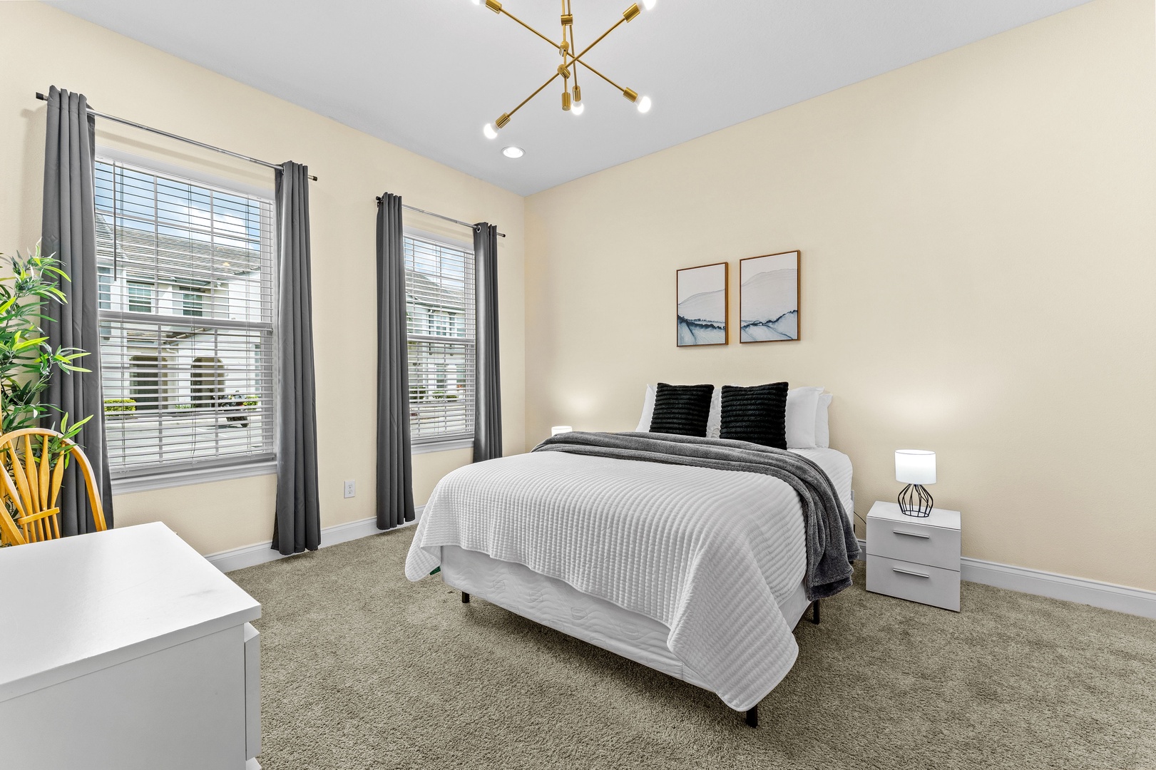 Bedroom 1 with queen bed, Smart TV, and shared ensuite