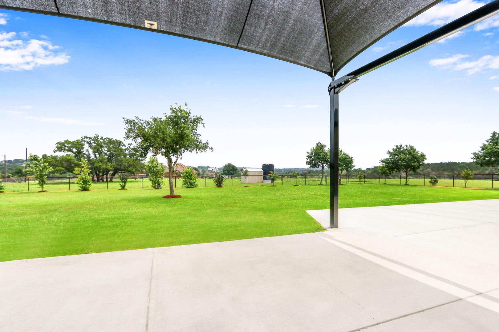 Step out onto the shaded patio & relax in the fresh air with gorgeous views