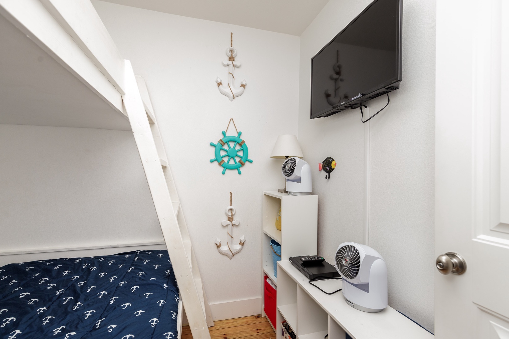 The cozy 2nd floor bunk room includes a full-over-twin bunkbed & Smart TV