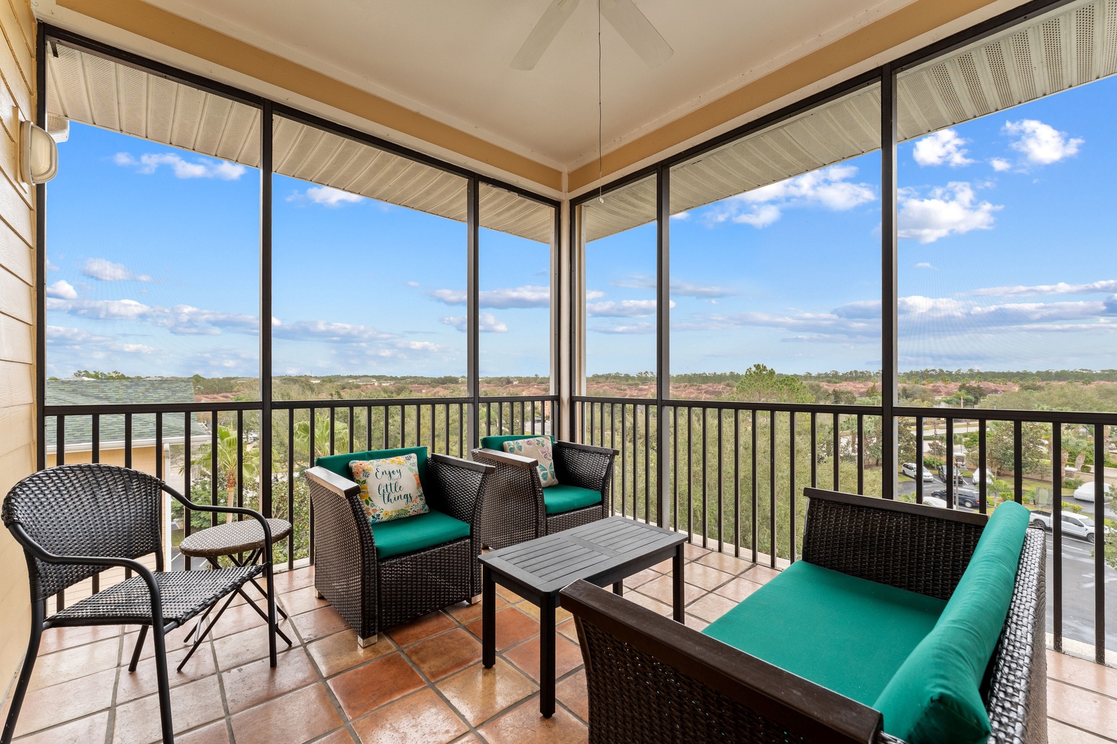 Enjoy morning coffee or dine alfresco on the breezy screened balcony