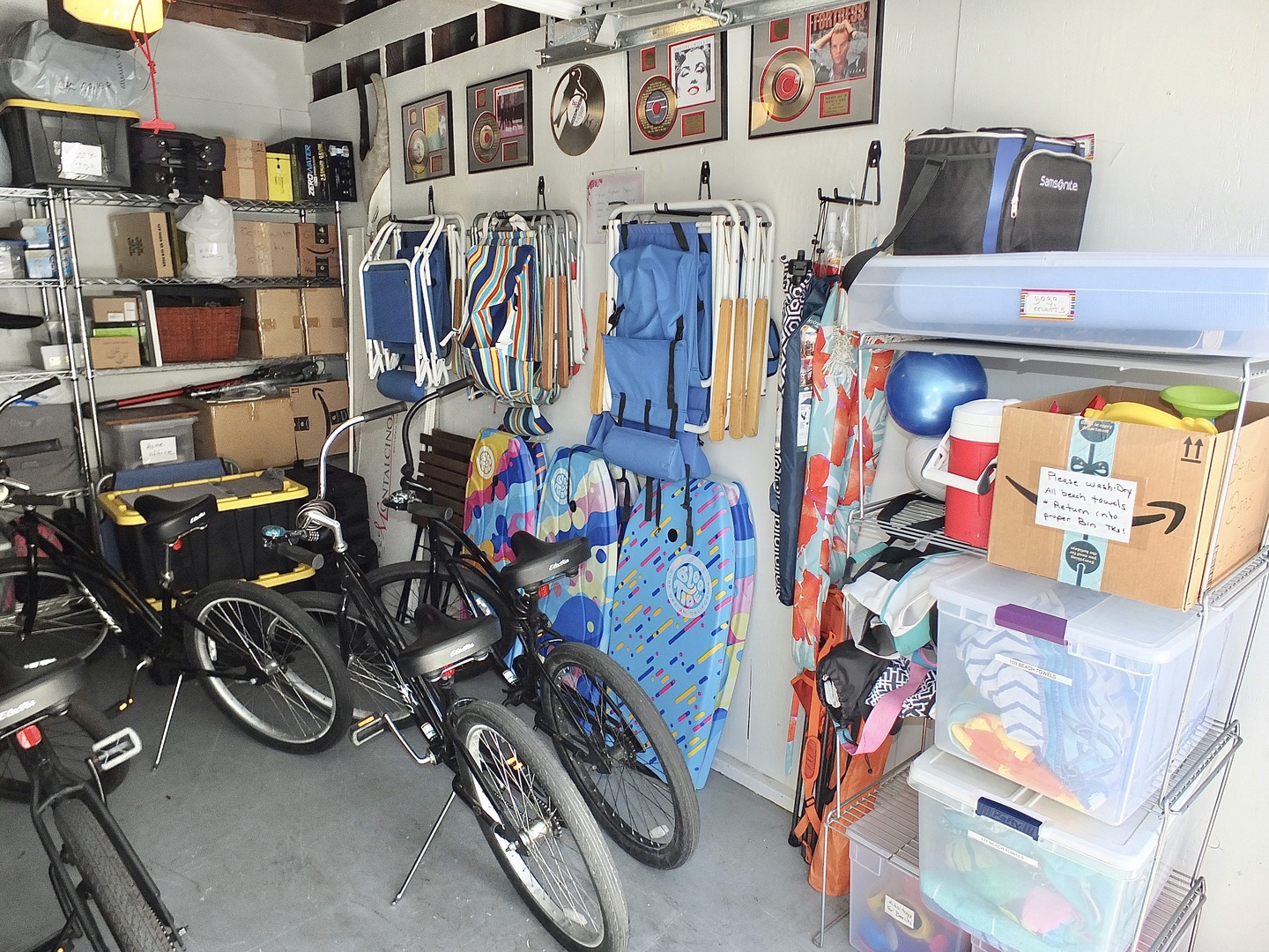 Beach Equipment stored in Garage (Bikes, Towels, Umbrellas, Chairs)
