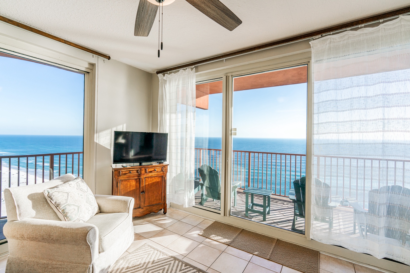 Floor-to-ceiling sliding glass door and windows around the home