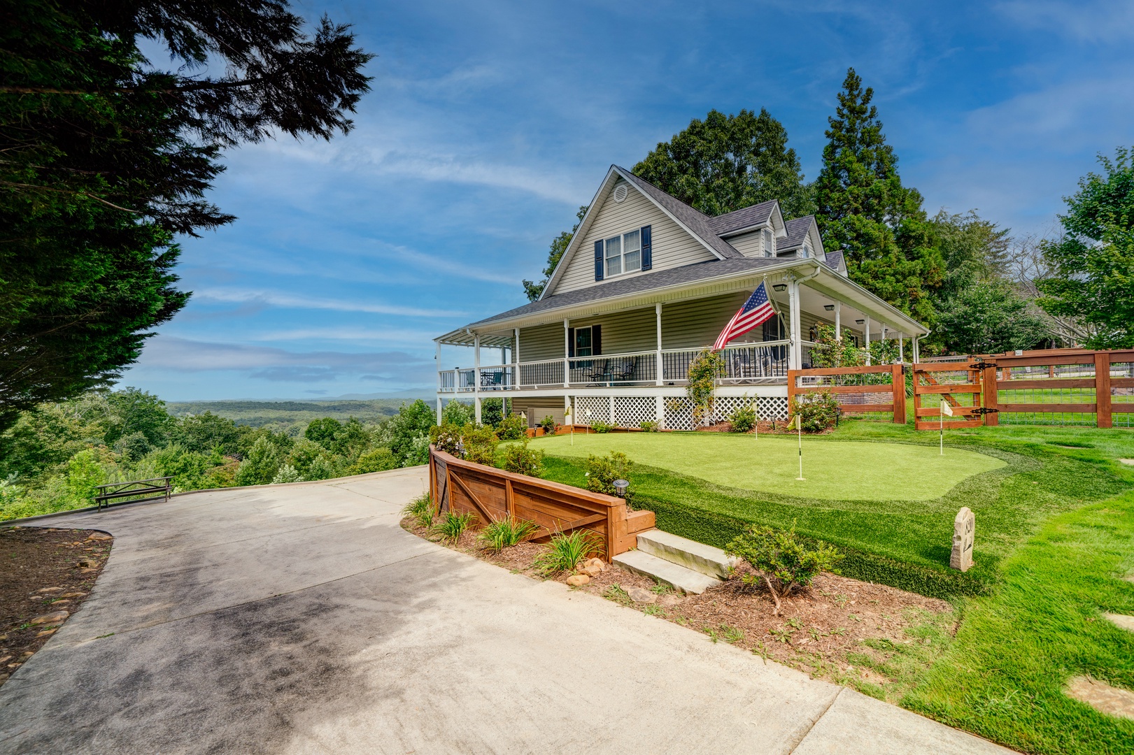 Left driveway has access to the putting green and the gated fenced in yard