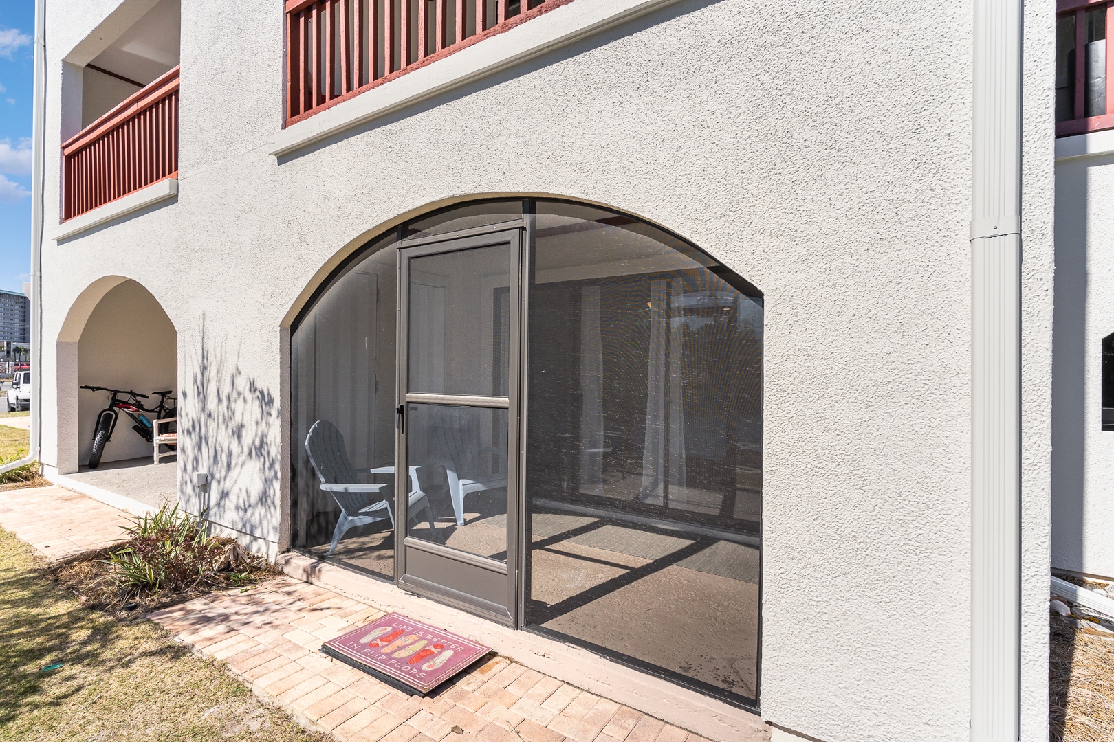 Lounge the day away with serene water views on the screened patio