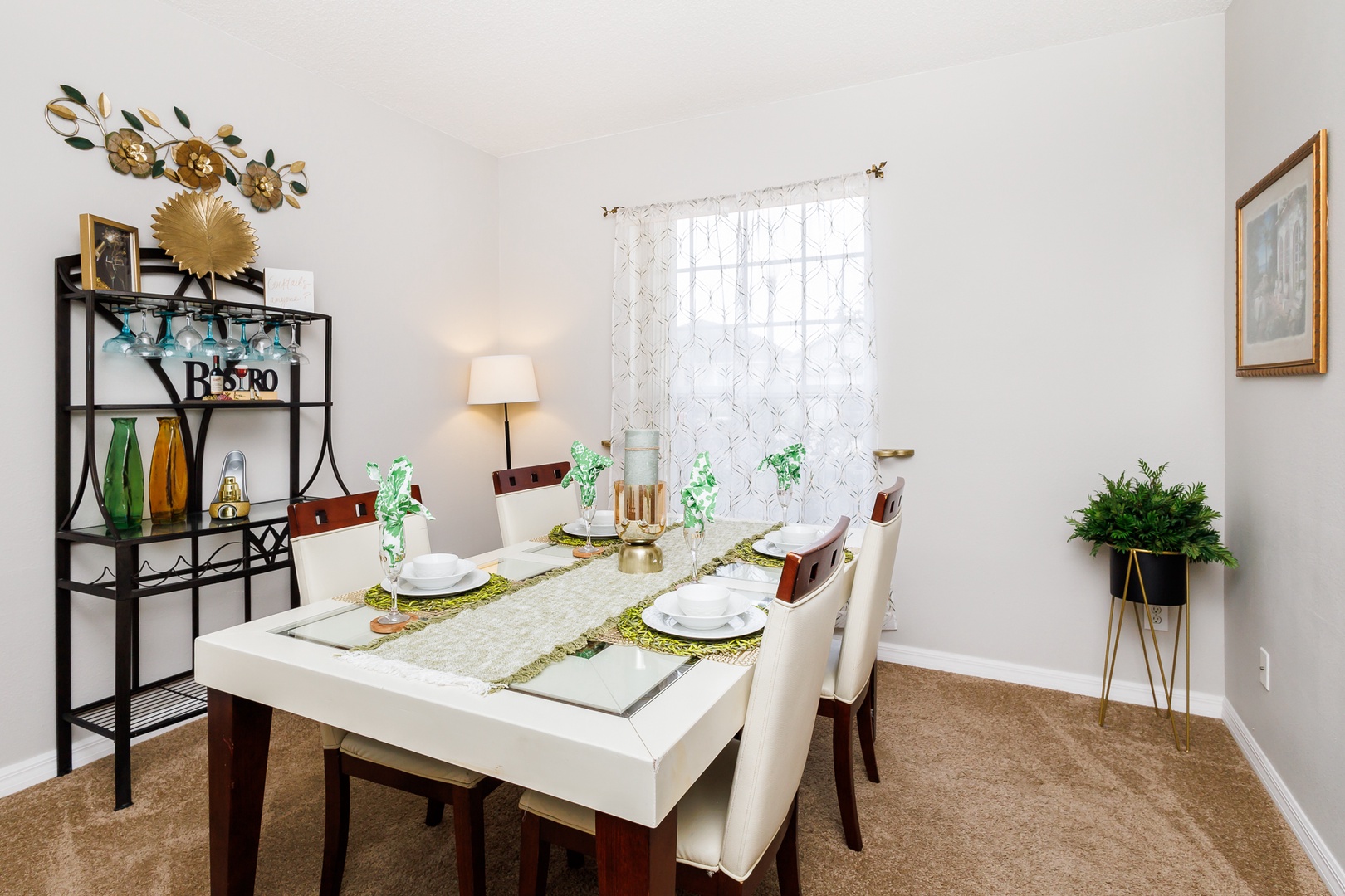 Gather for meals together at the formal dining table, with space for 6