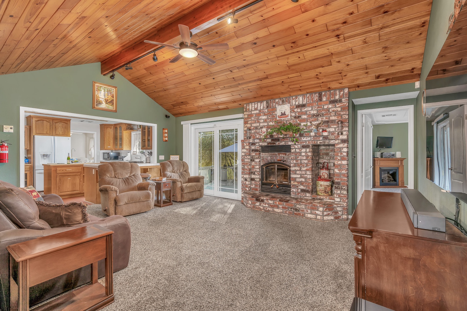 Cozy up near the fireplace and enjoy a nice flick at the end of the night