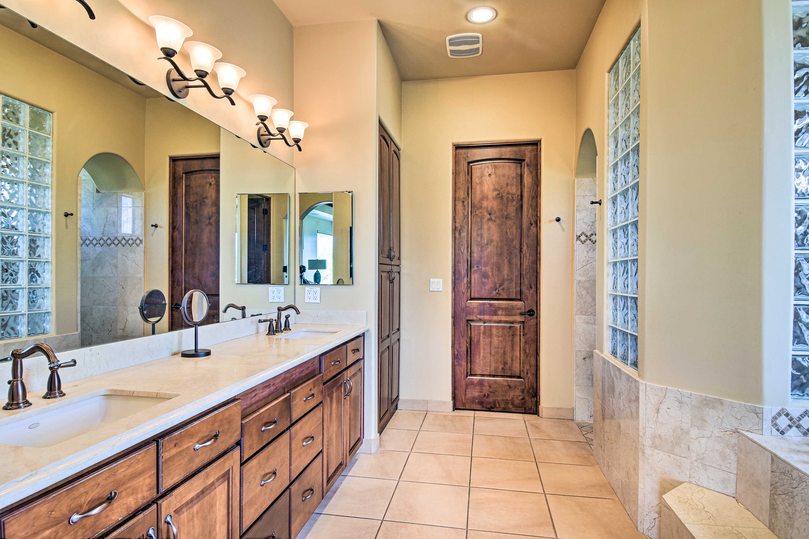This king ensuite includes a double vanity & separated shower/soaking tub