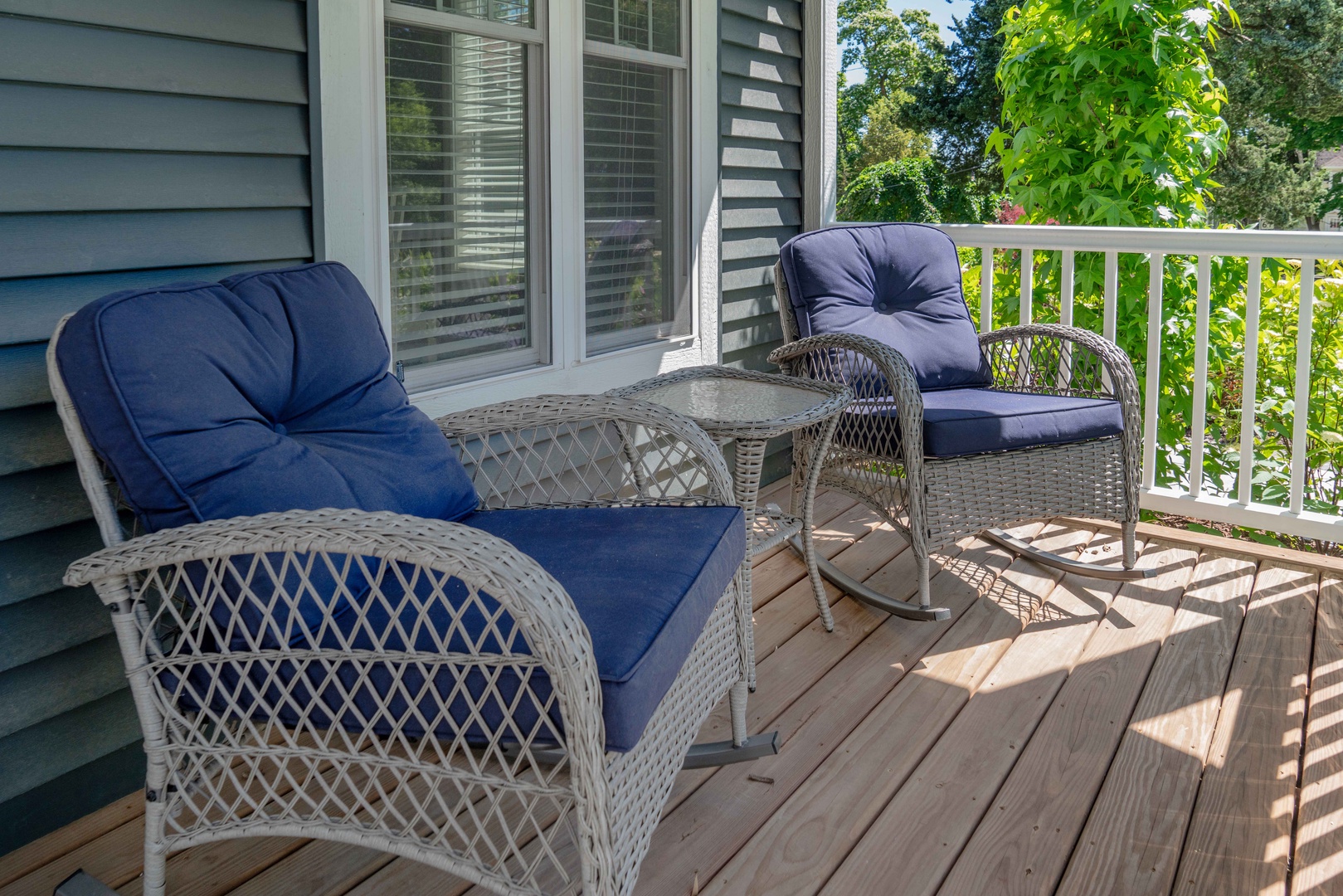 Sip morning coffee or enjoy a cocktail on the breezy front porch