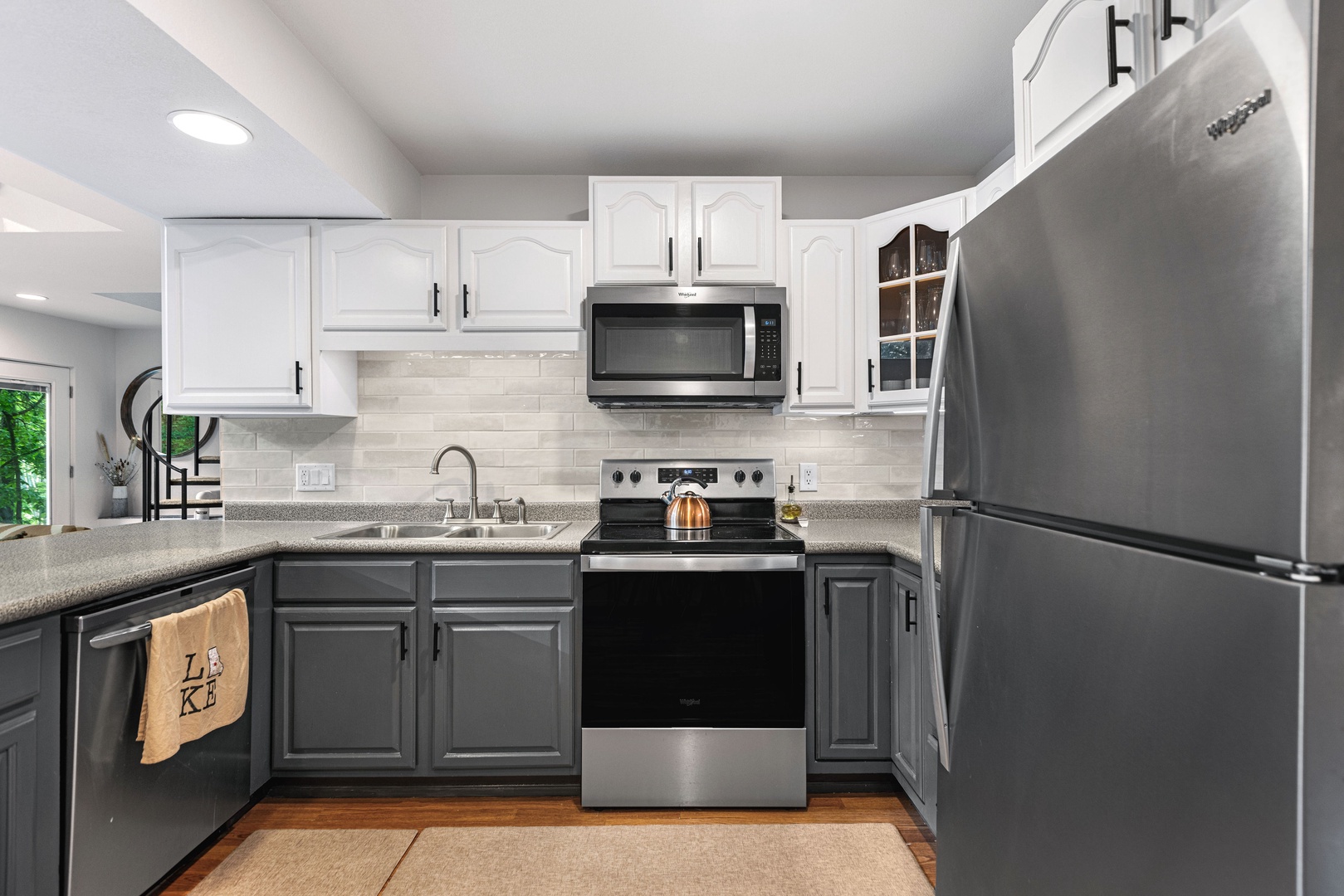 The open, airy kitchen offers ample space & all the comforts of home