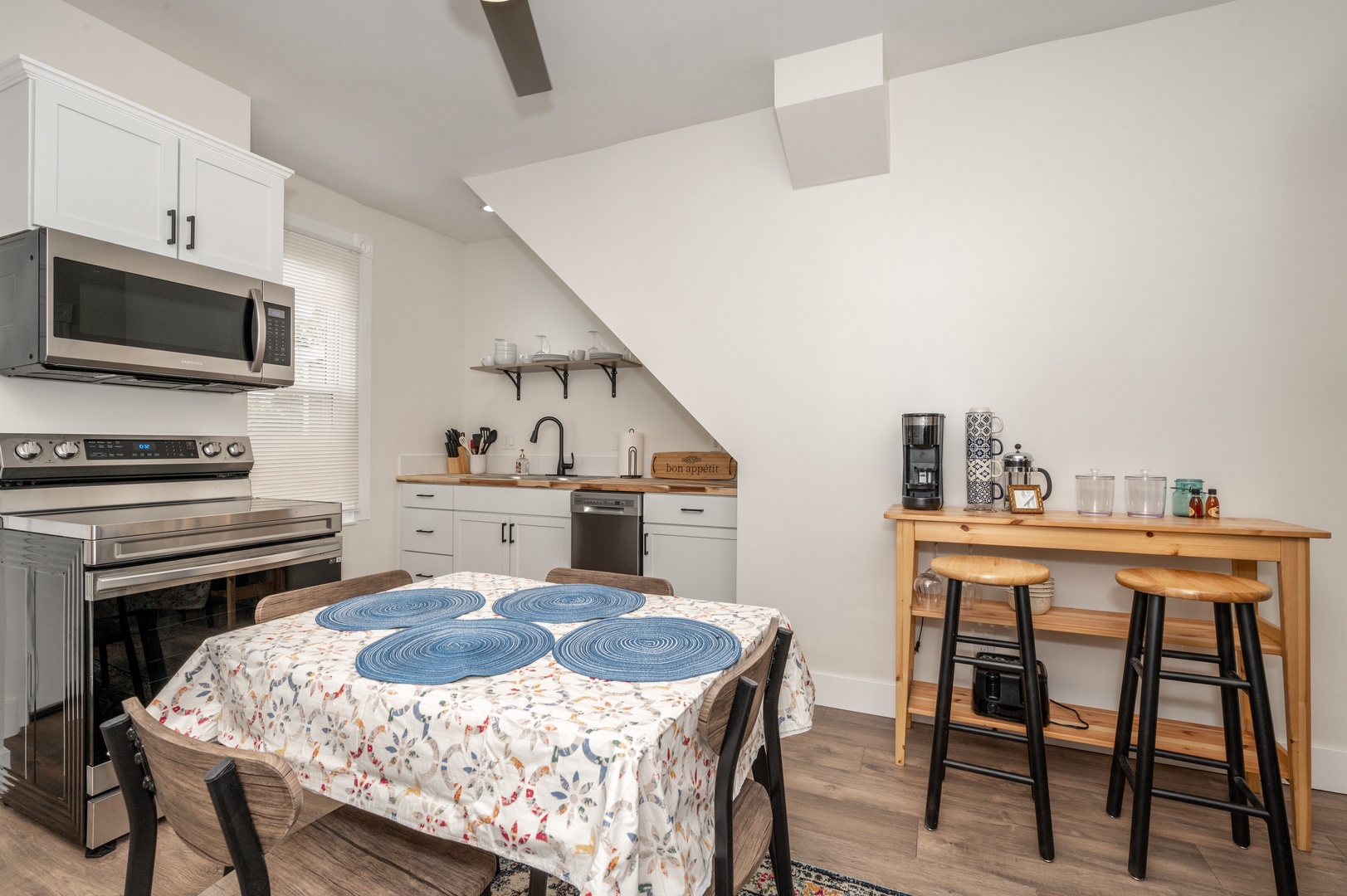 Apartment A’s airy kitchen offers ample space & every home comfort