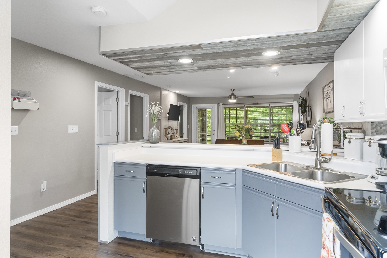 The open, airy kitchen offers ample space & all the comforts of home