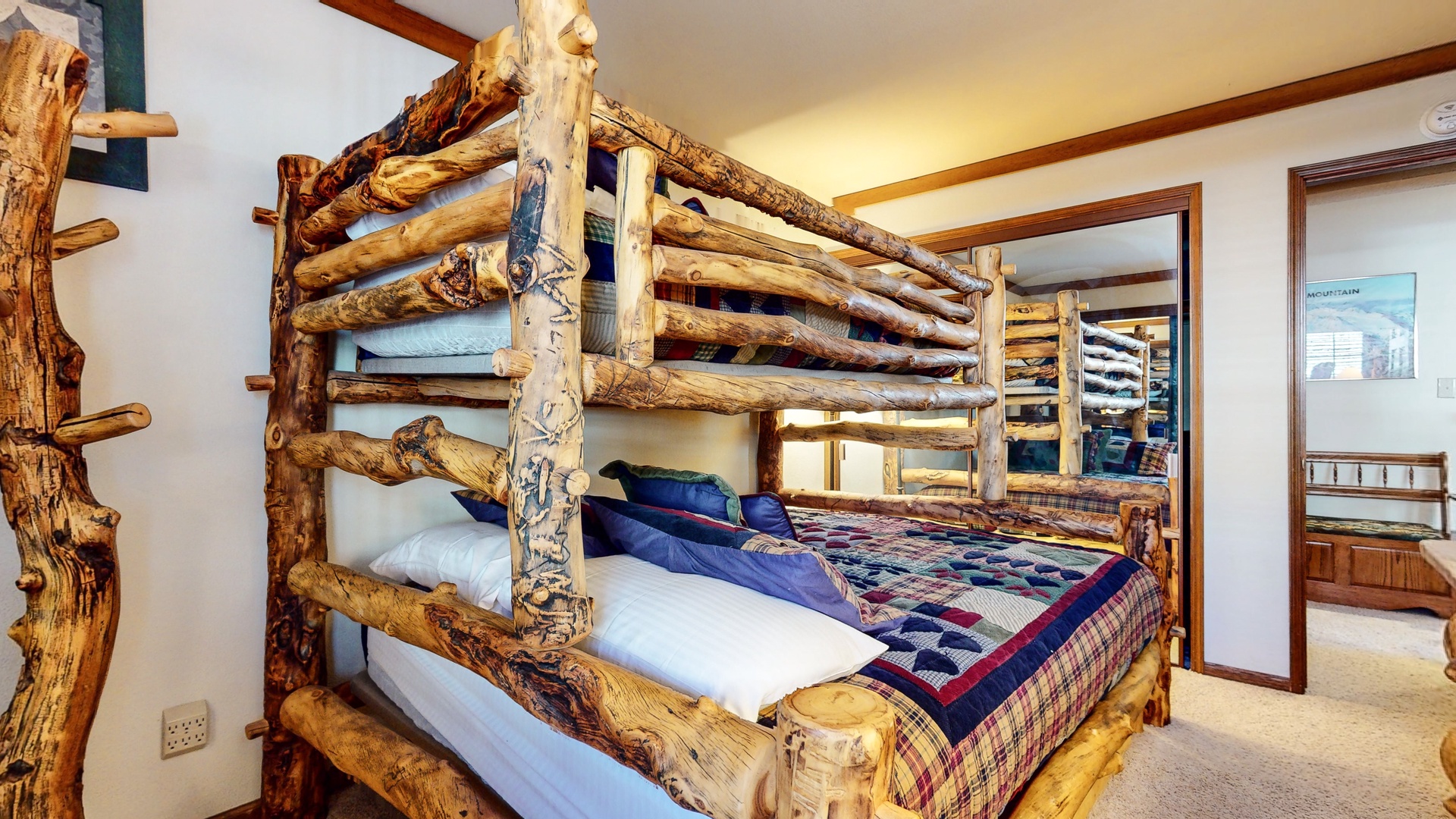 The second bedrooms offers a twin/queen bunk bed and Smart TV