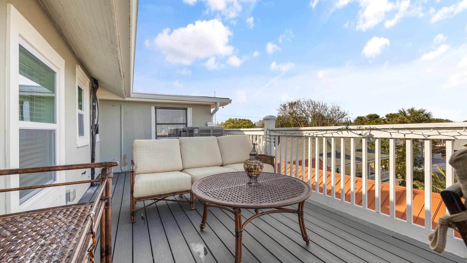 Enjoy meals alfresco or lounge with gorgeous water views on the deck