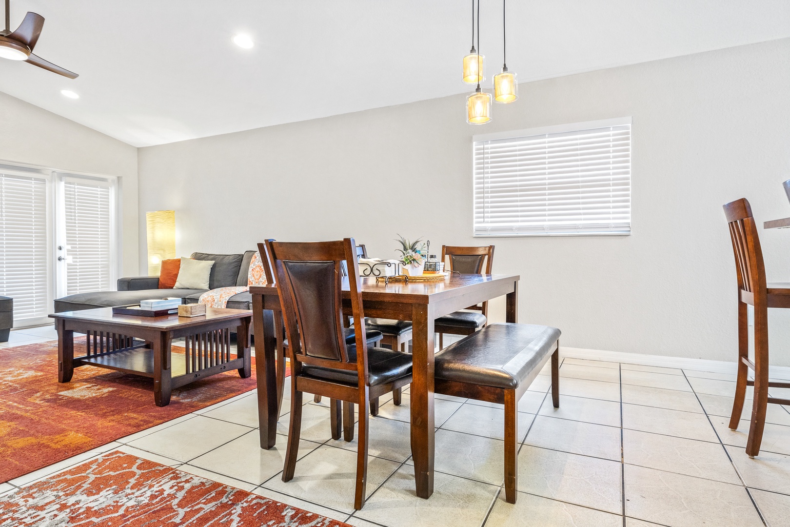 Gather for meals together at the elegant dining table, seating 6