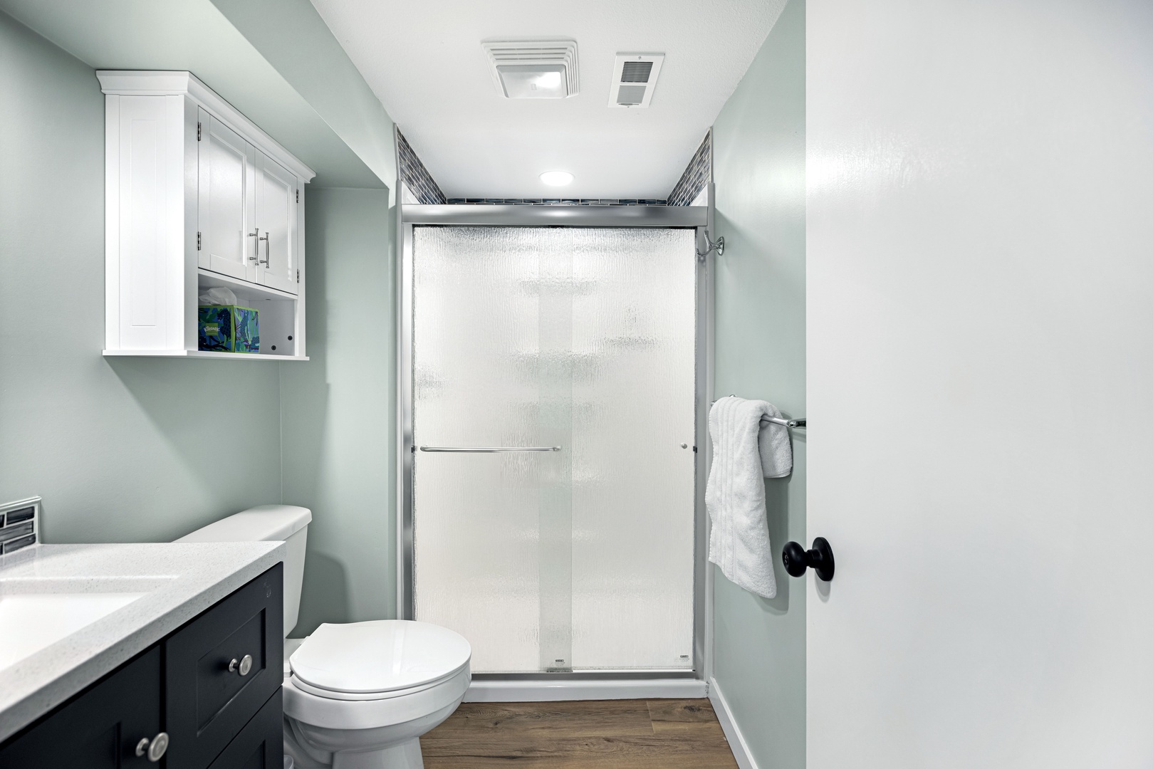 Shared bathroom with stand-up shower